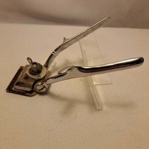 Vintage Burman clippers with hair and beard